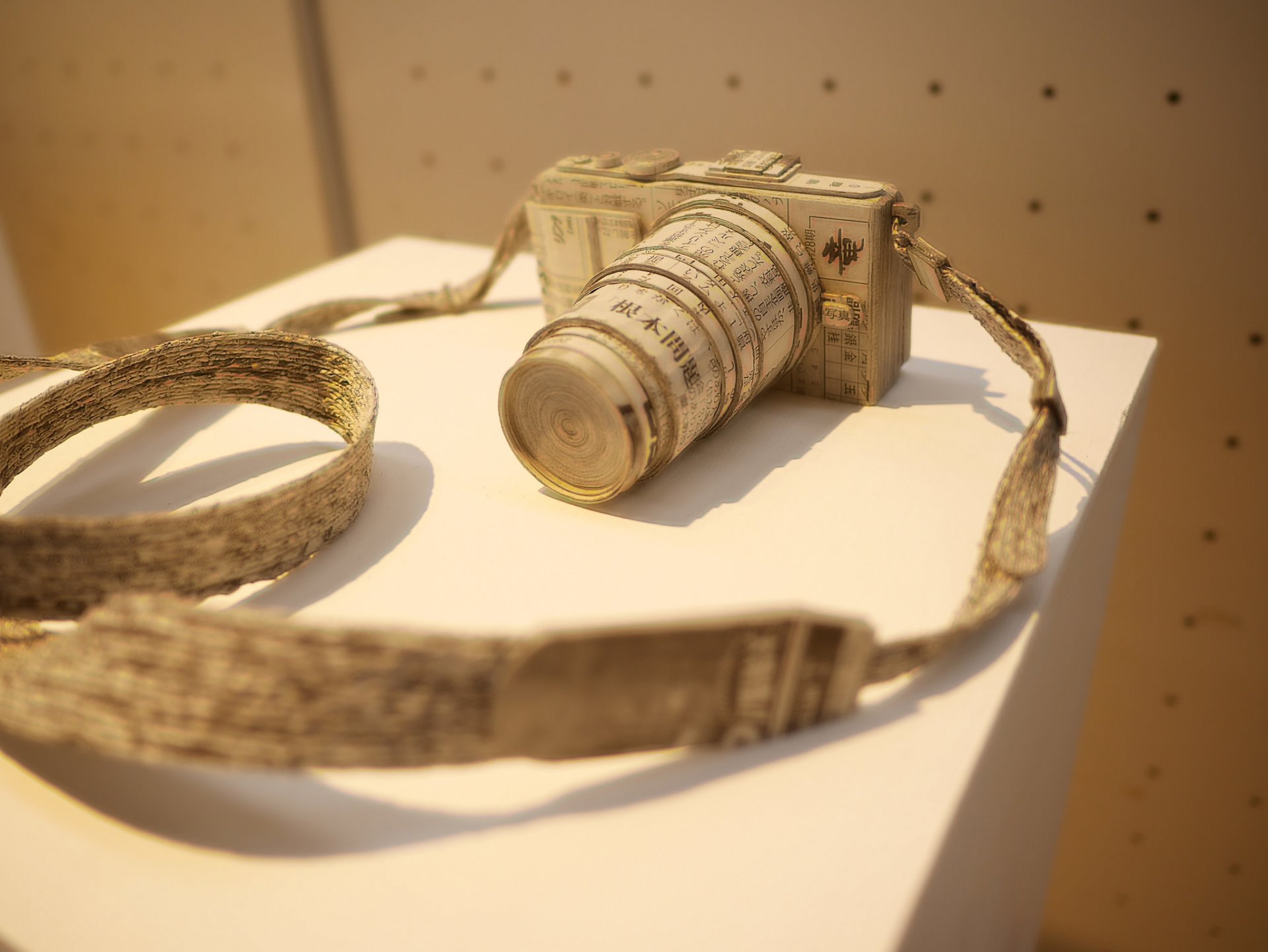 newspaper camera close up background