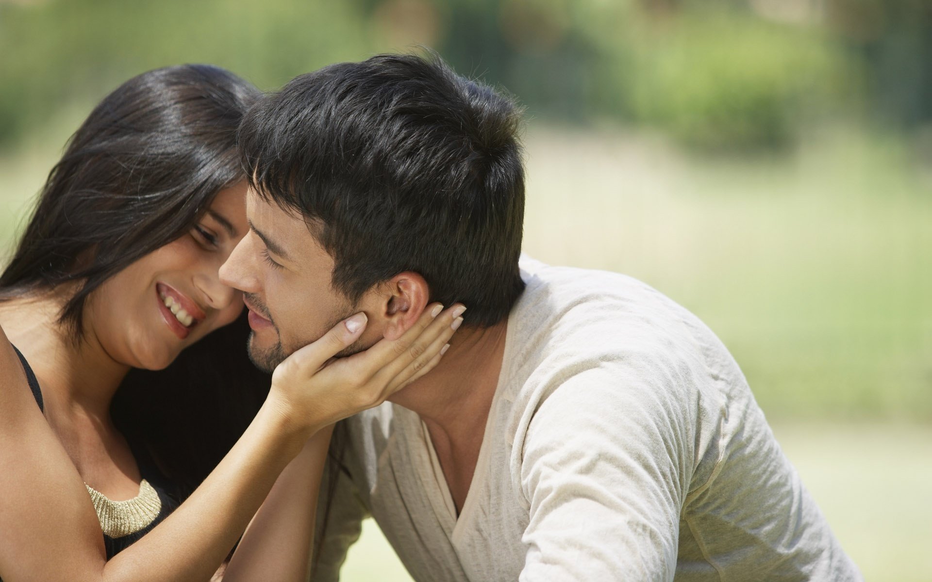 A couple in love in a sunny glade