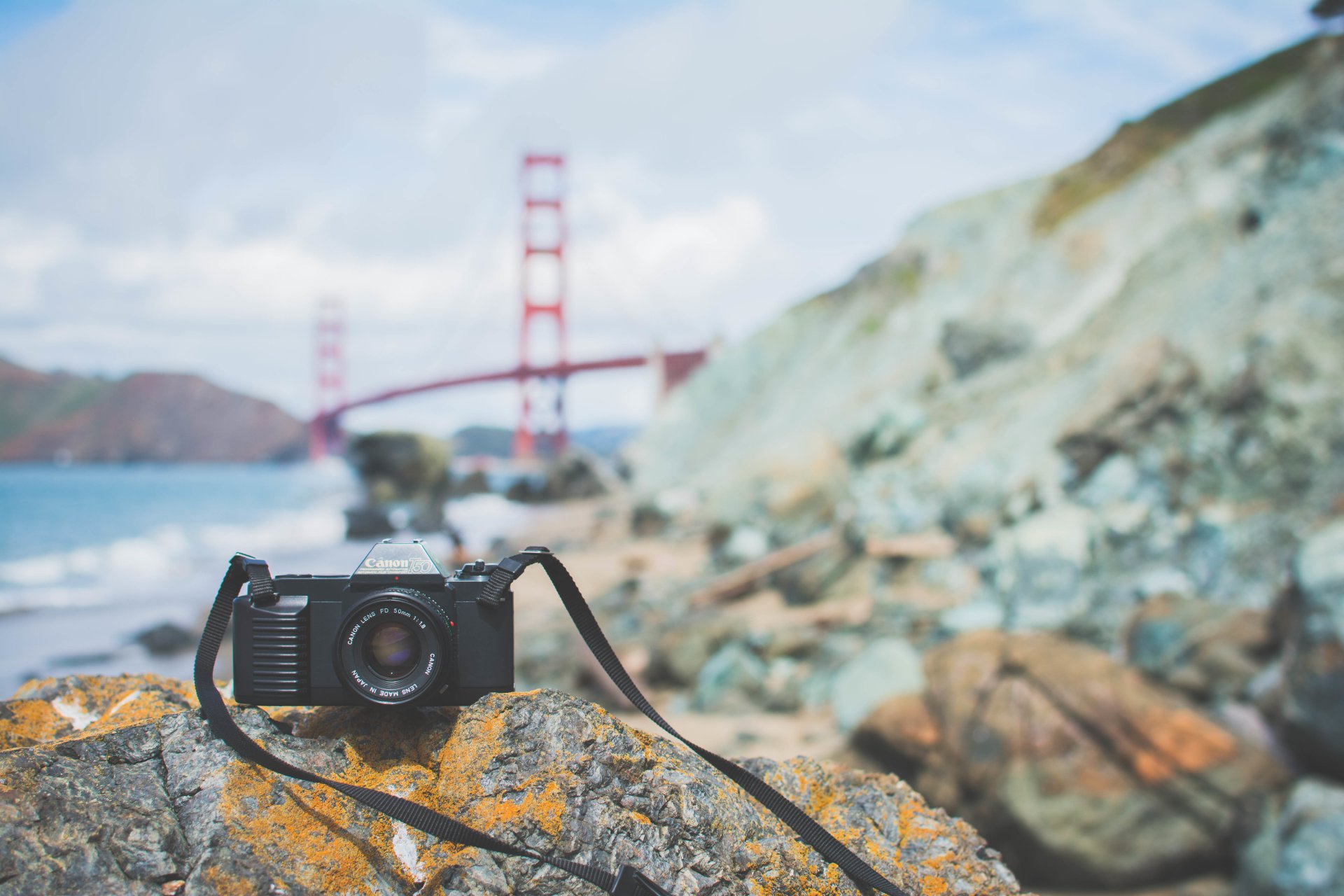 a camera canon lens the camera stones bridge