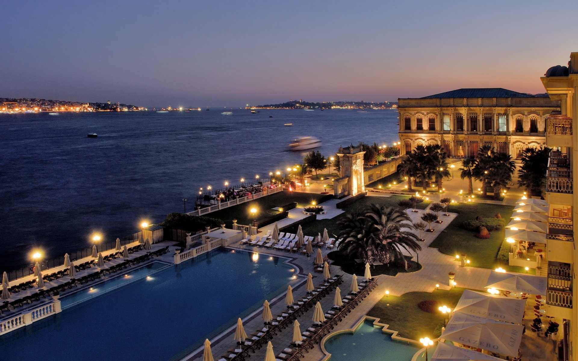 The territory of the hotel on the seashore under the night sky