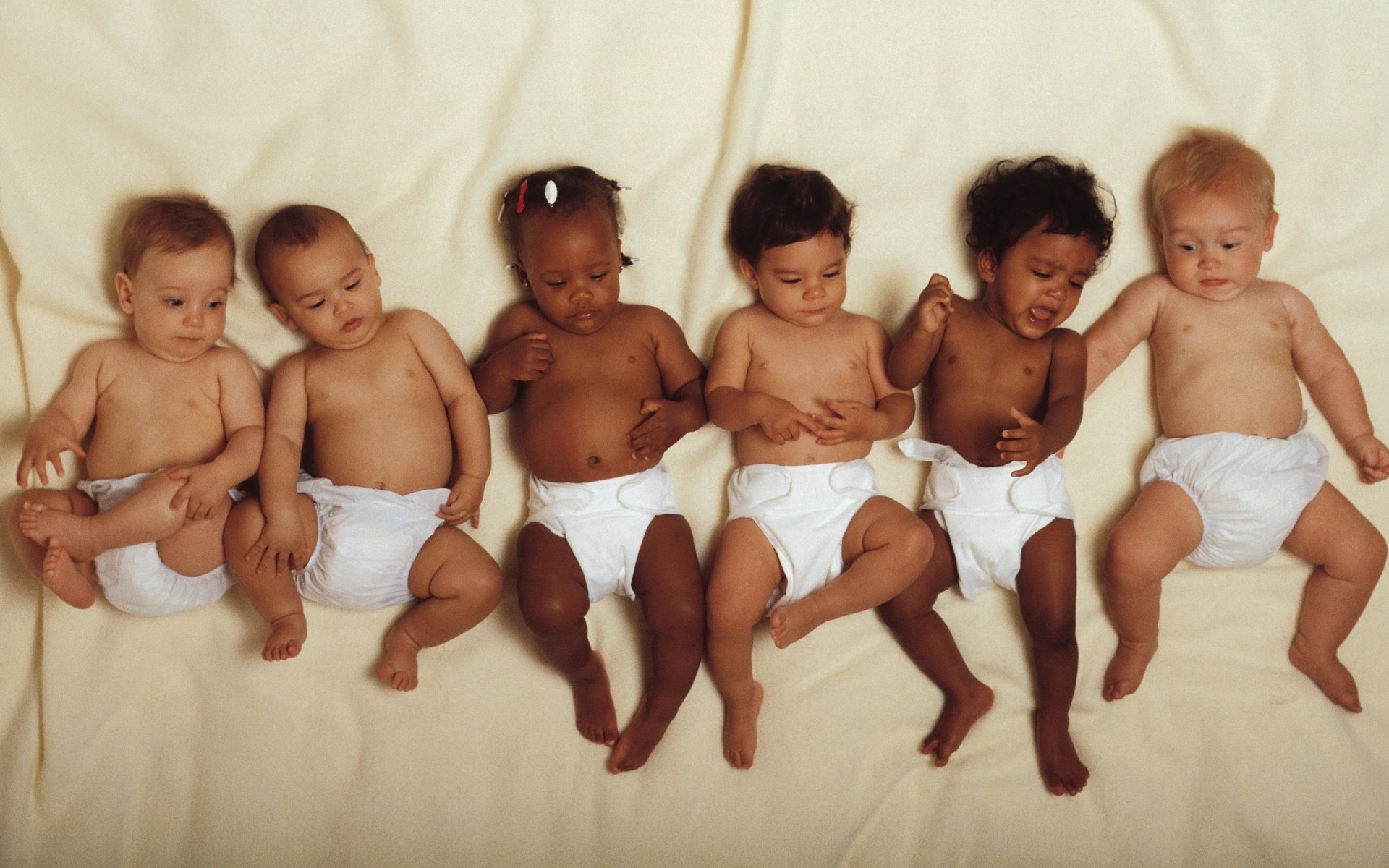 Children of different races in the same diapers