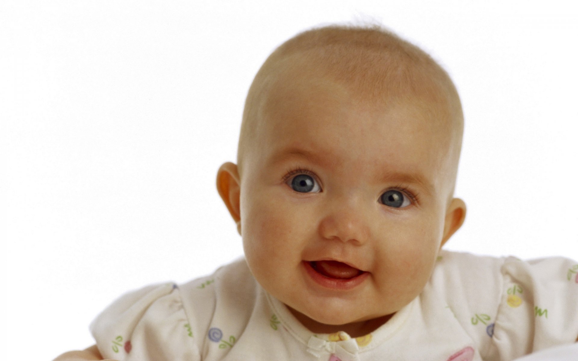 Smiling baby on a white background
