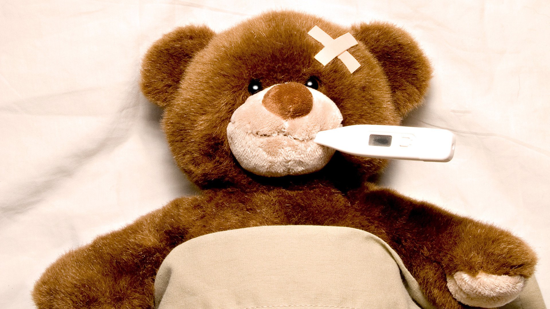 Sad sick teddy bear