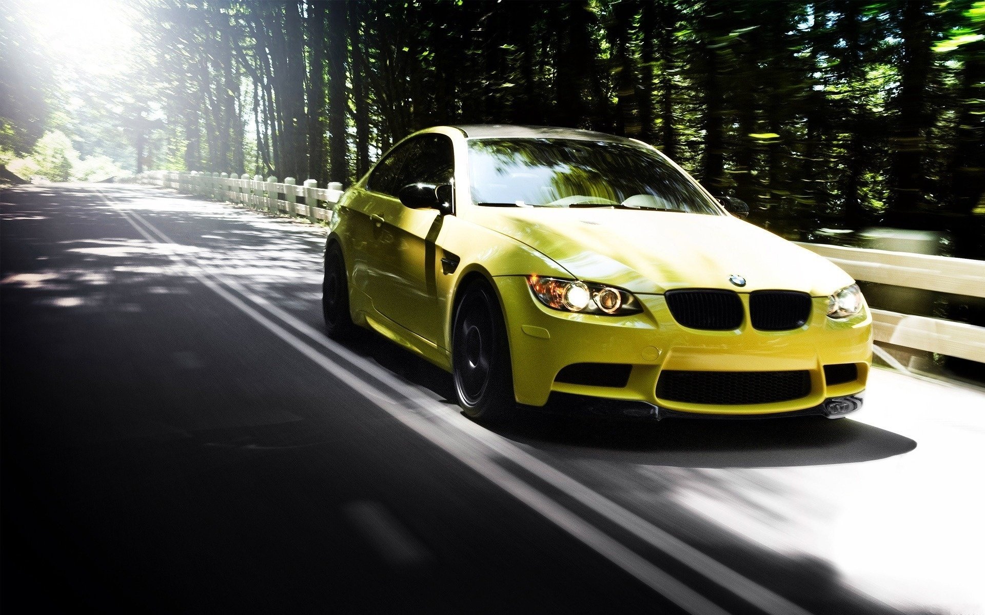 New BMW m3 yellow on the road