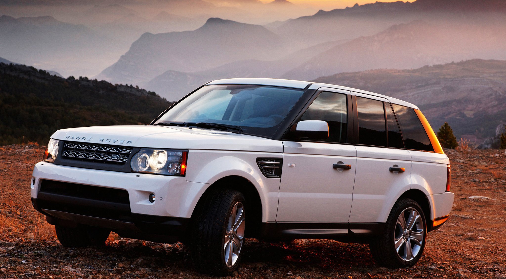Range Rover car in the mountains in white