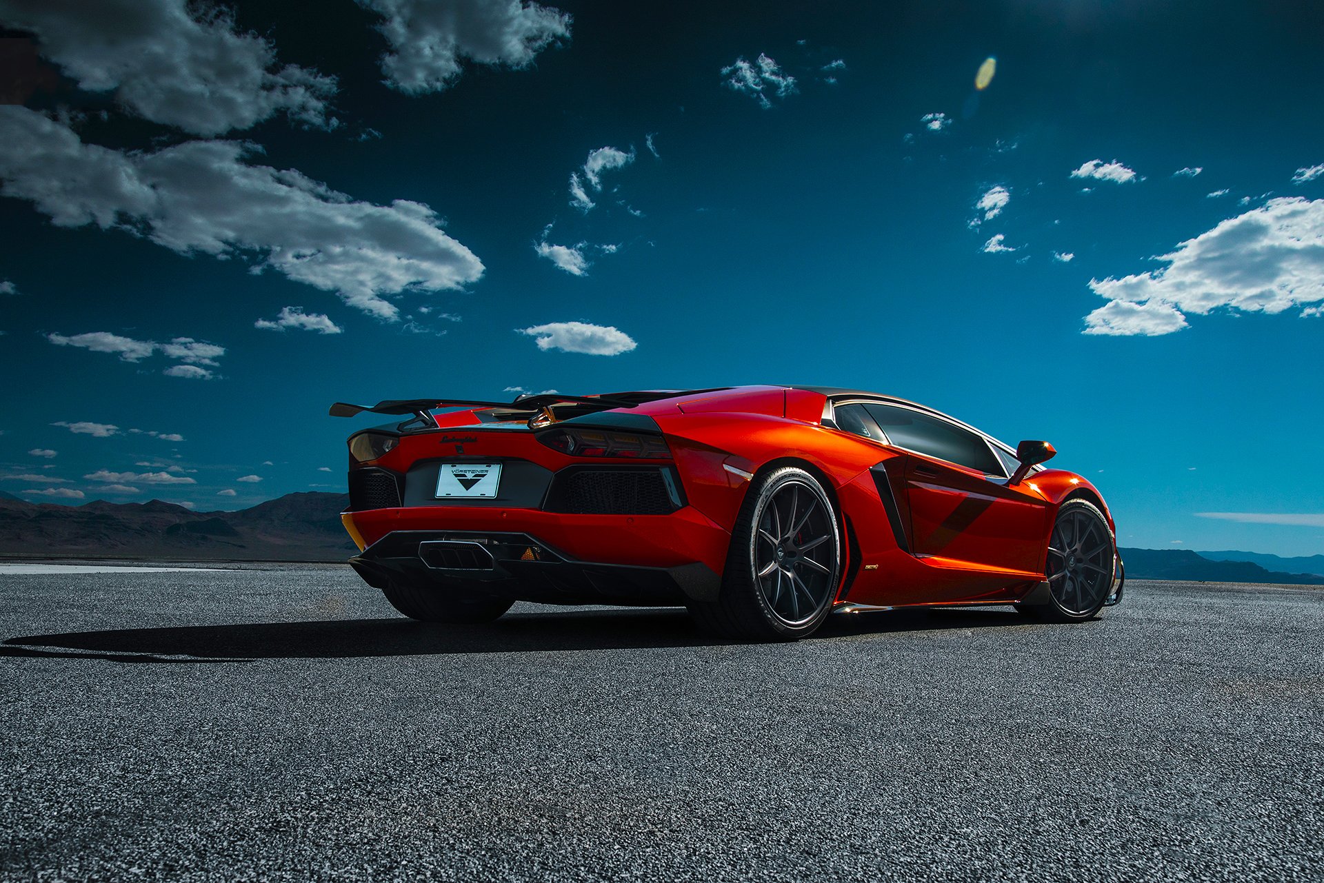 lamborghini aventador-v lp740-4 zaragoza vorsteiner supercar orange rear desert sky clouds