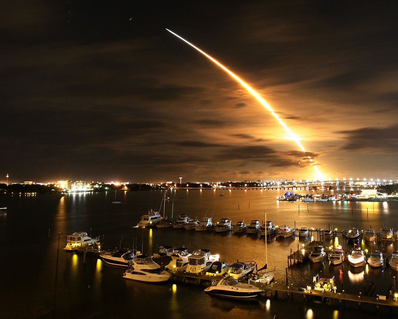 Rocket launch at night at the pier