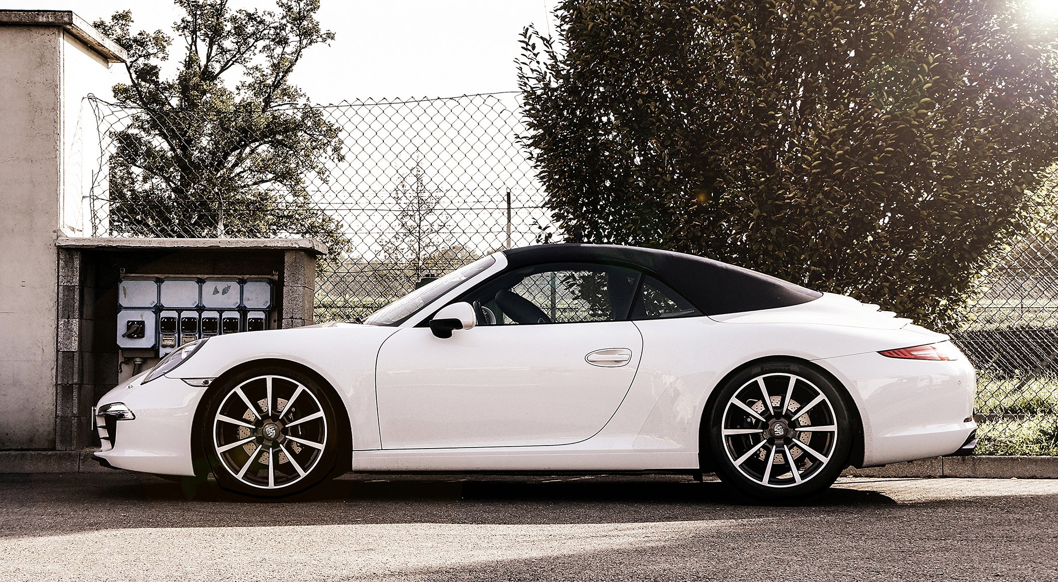 porsche carrera cabrio white sun tree convertible fence