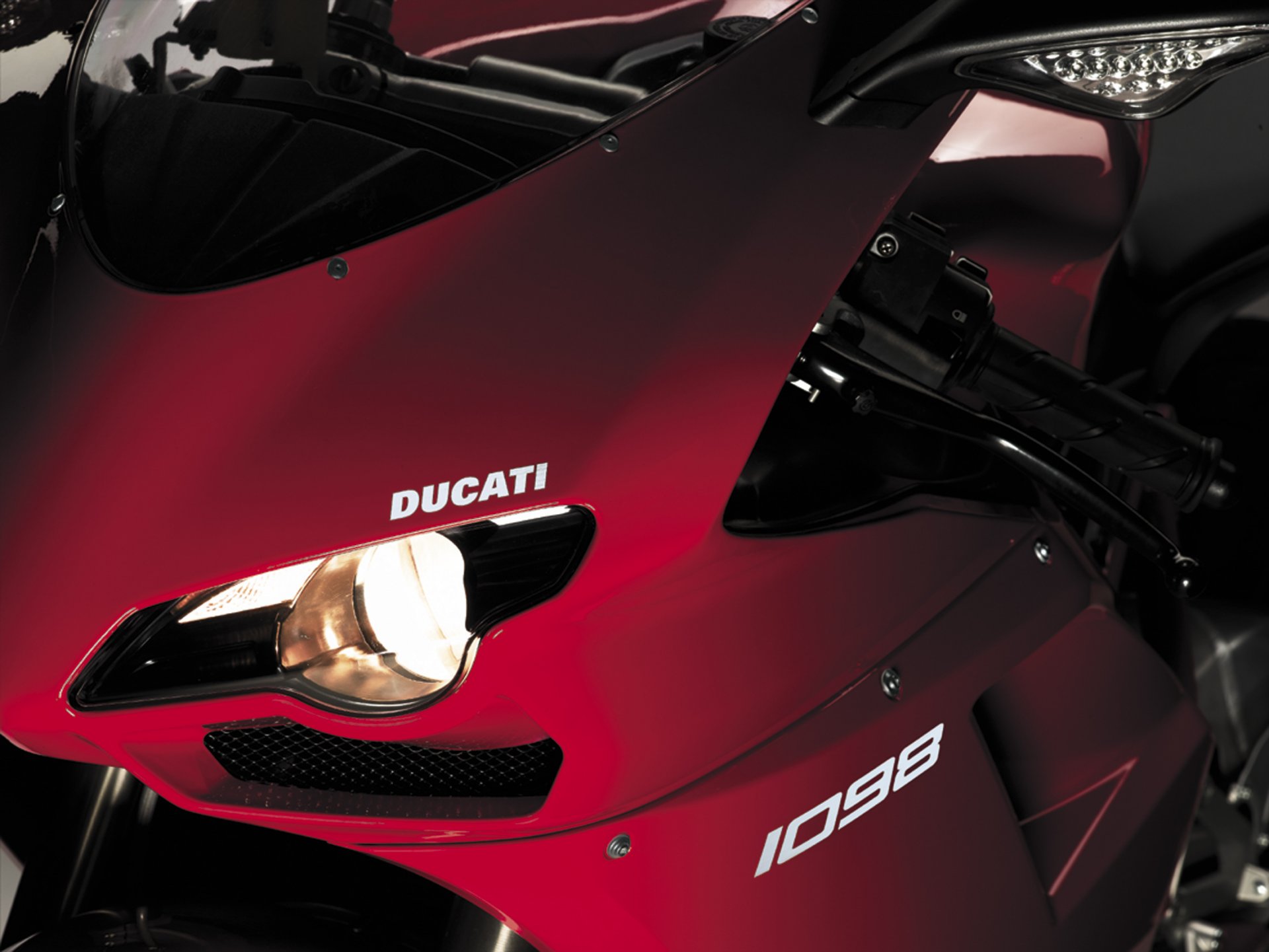 Headlights of a red ducati motorbike