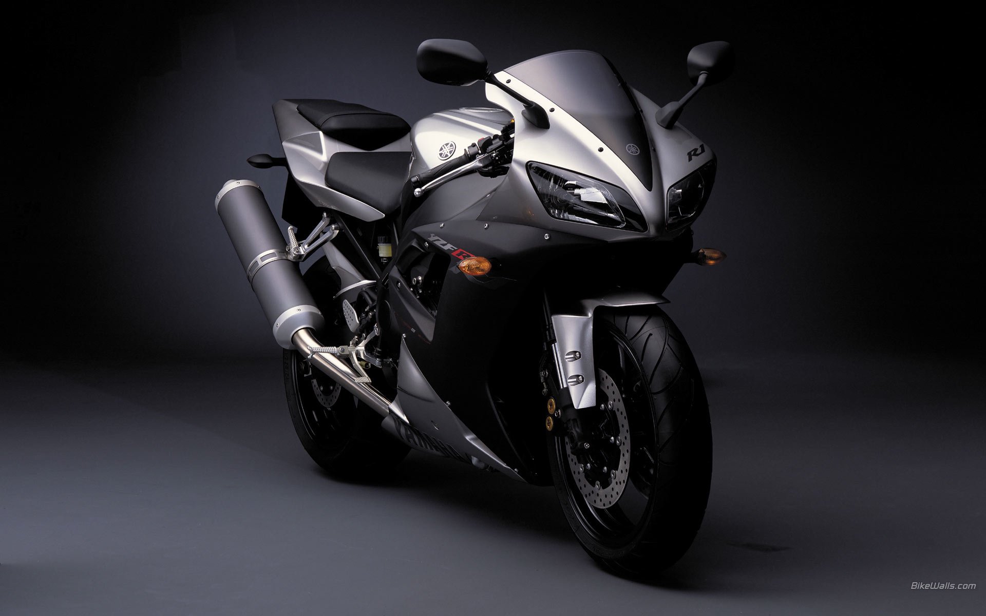 Stylish black yamaha bike on a solid background