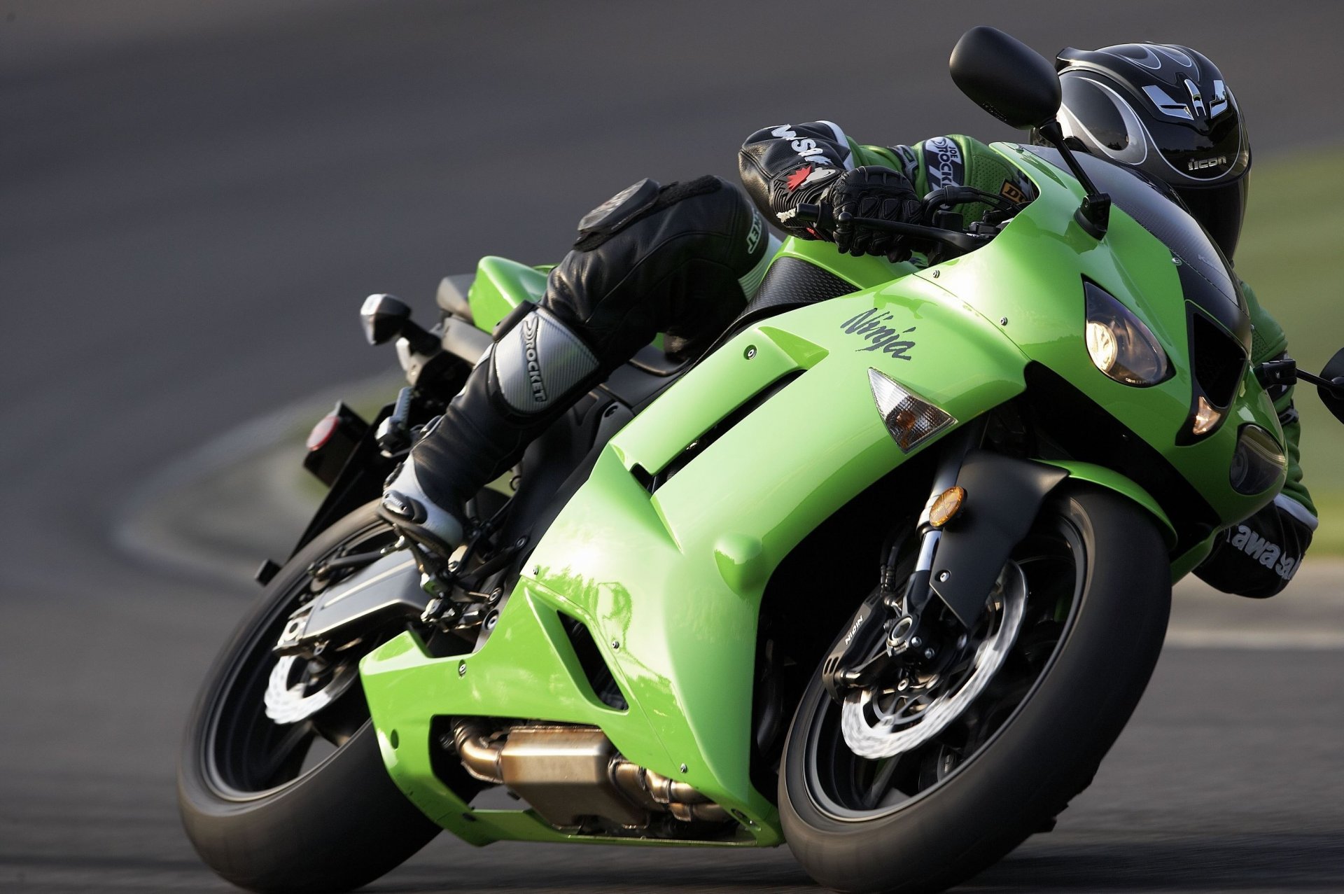Green motorcycle on the race track