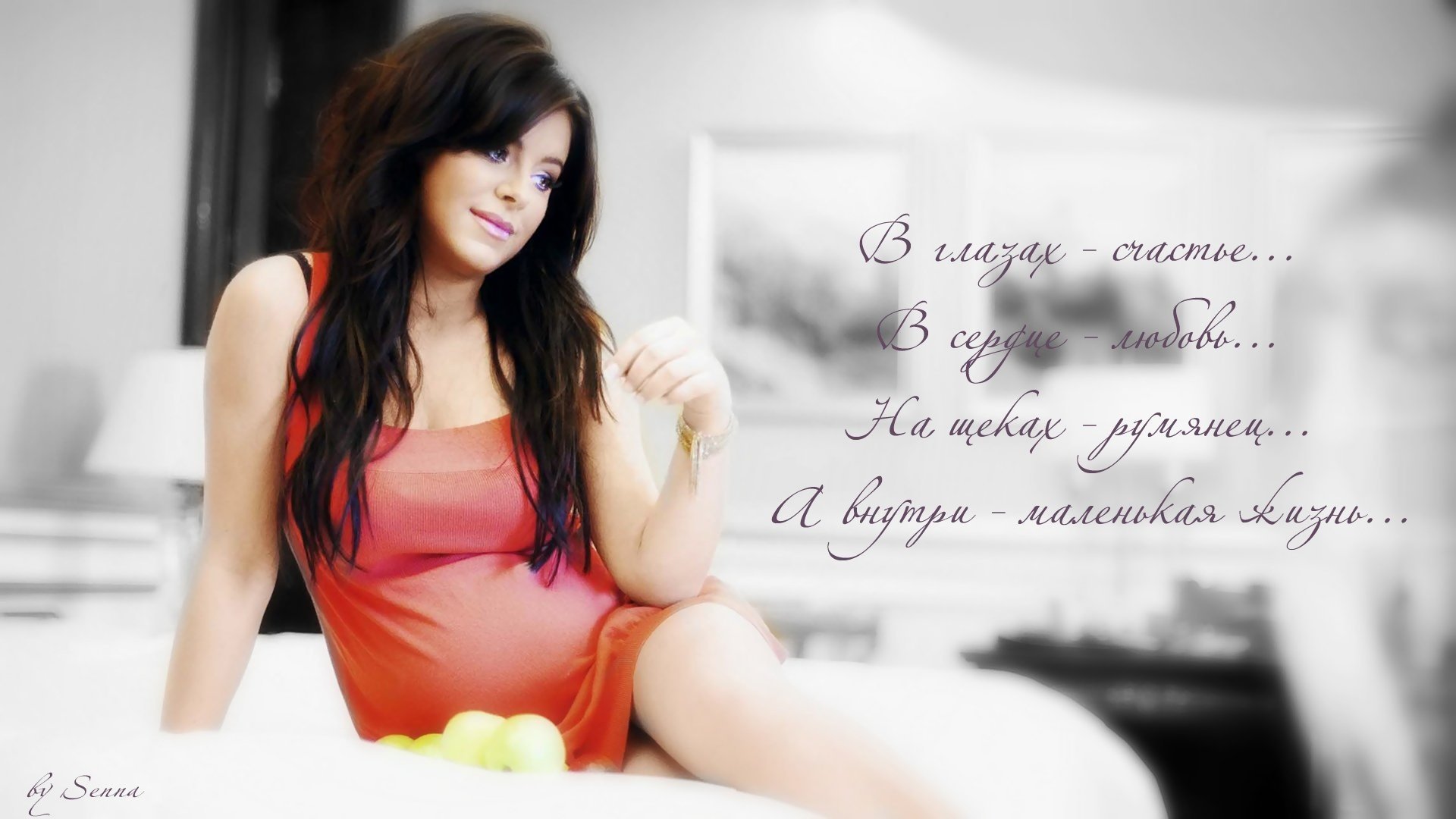 Pregnant ani lorak in a red dress