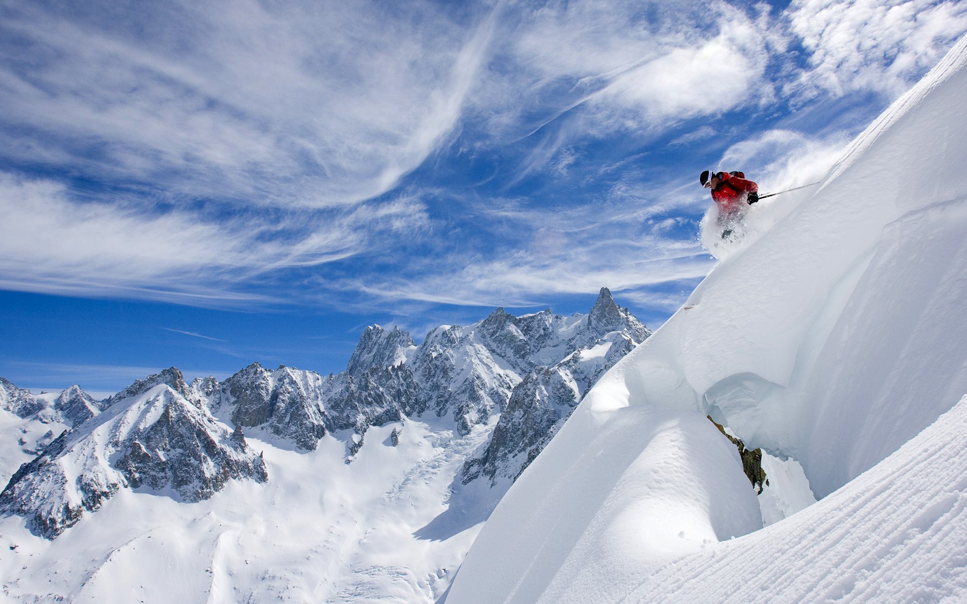 Skier at the top of a dangerous cliff