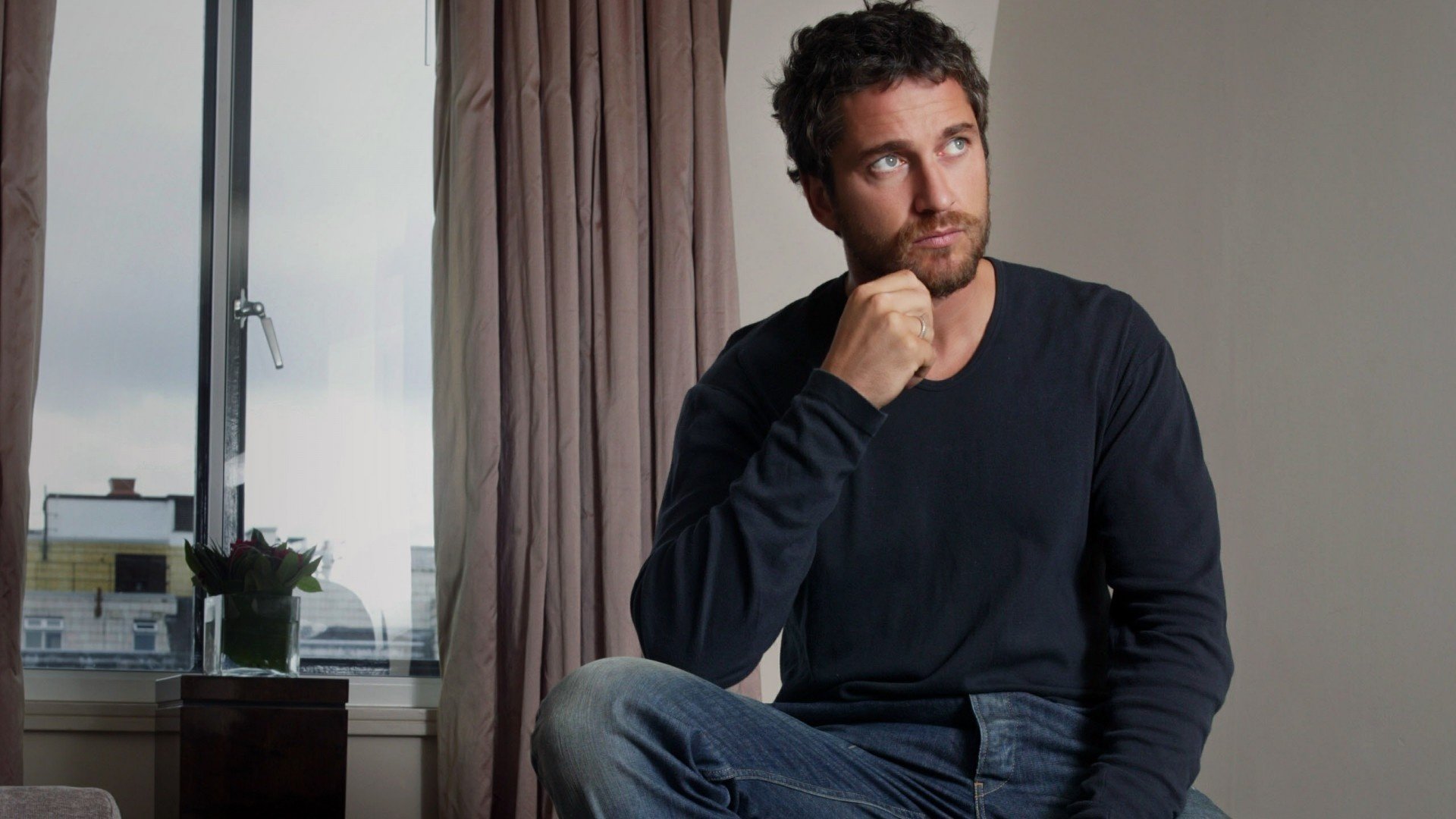 Gerard Butler is lost in thought