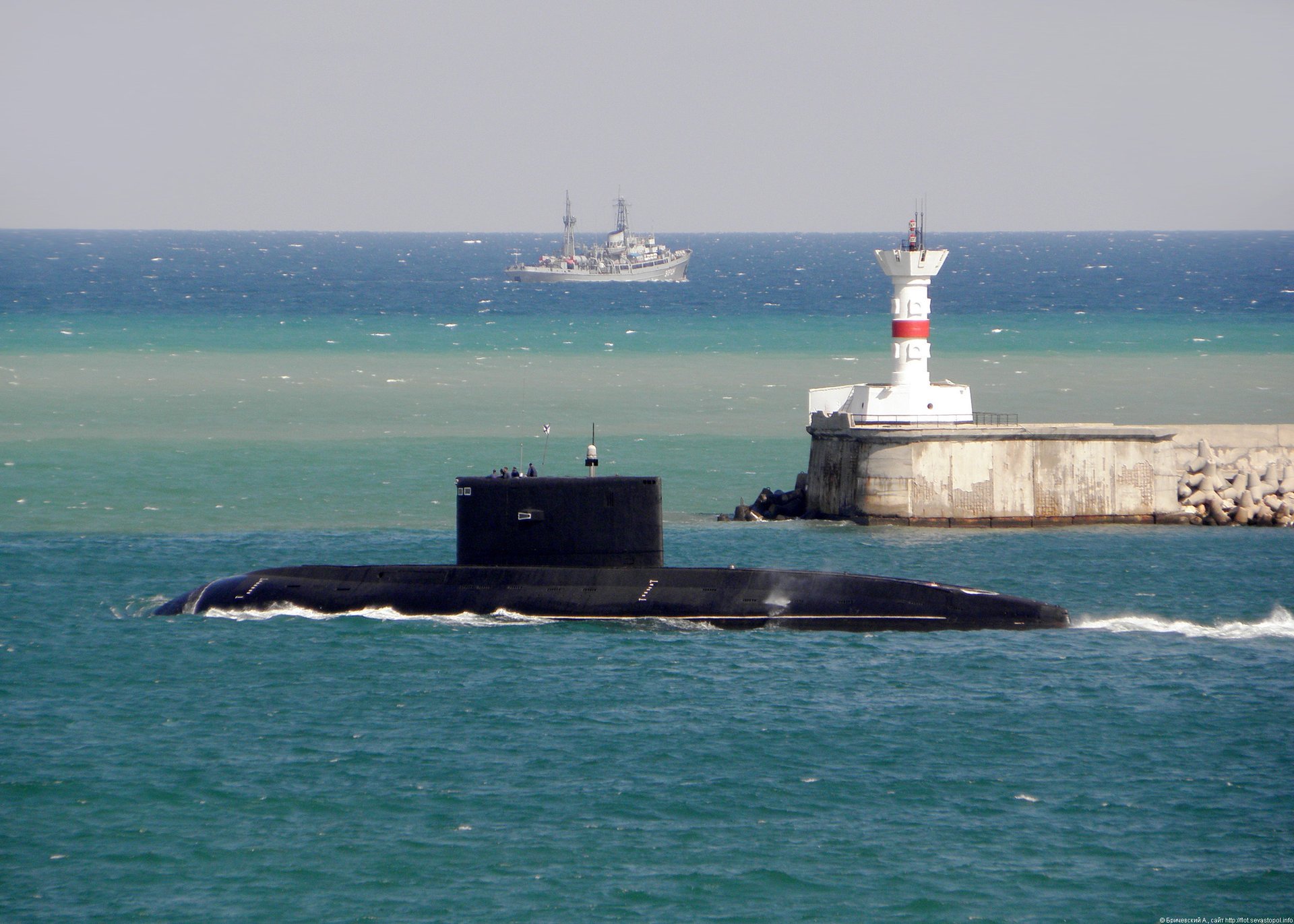 A submarine is on the horizon. sea and horizon