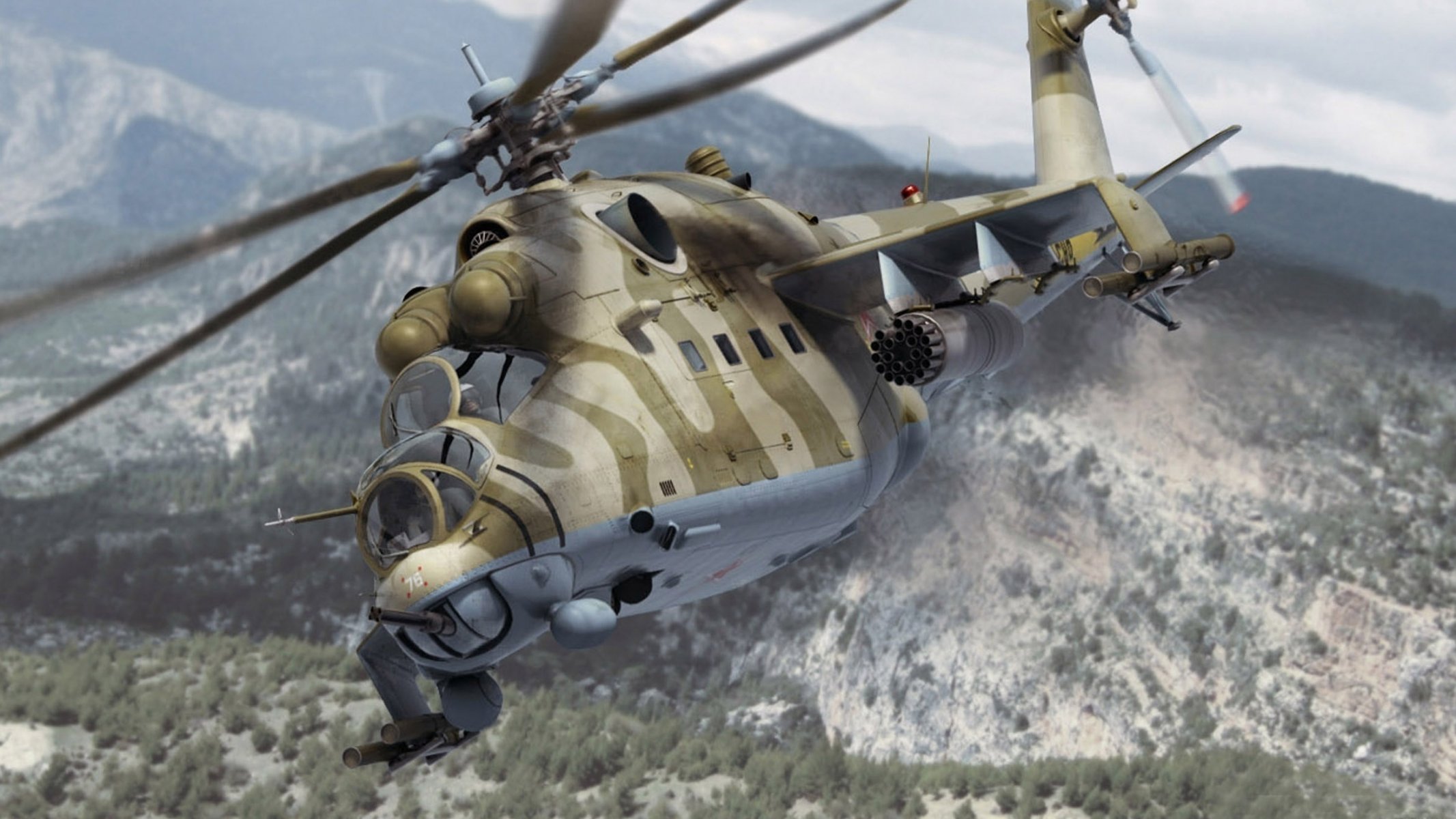 Military, Soviet, transport and combat helicopter over the mountains