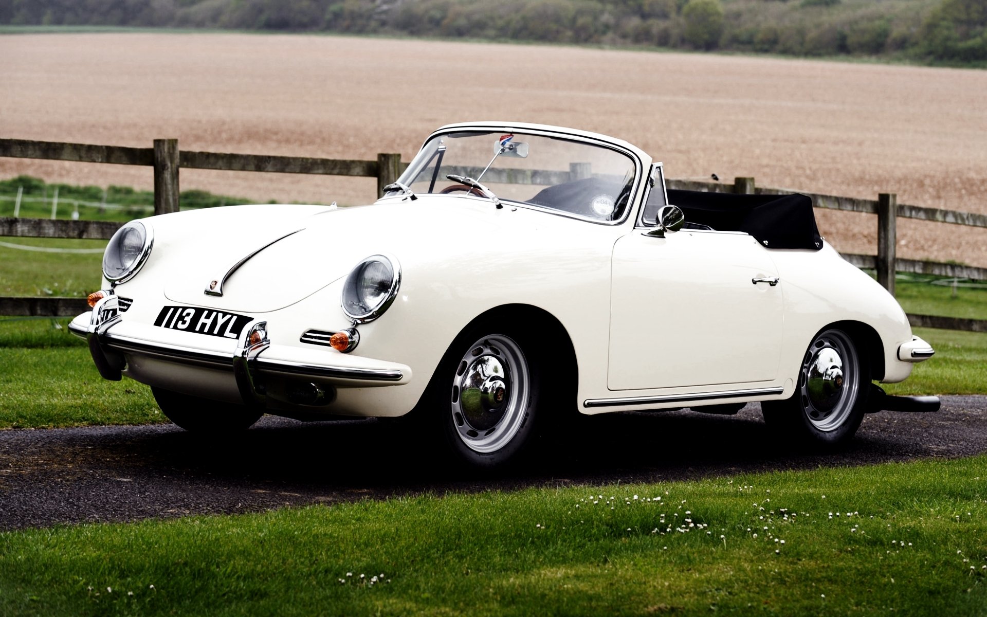 porsche 356b 1600 t- 6 roadster 1962 front white classic grass hedge the field