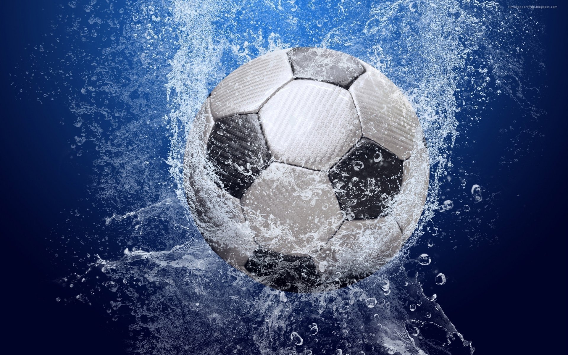 A soccer ball in a splash of water