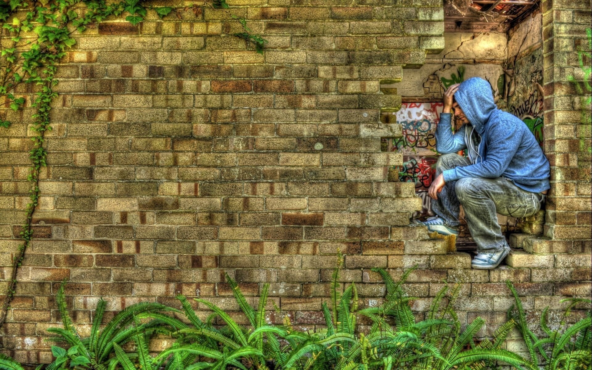 Brick wall. The sadness of a lonely man