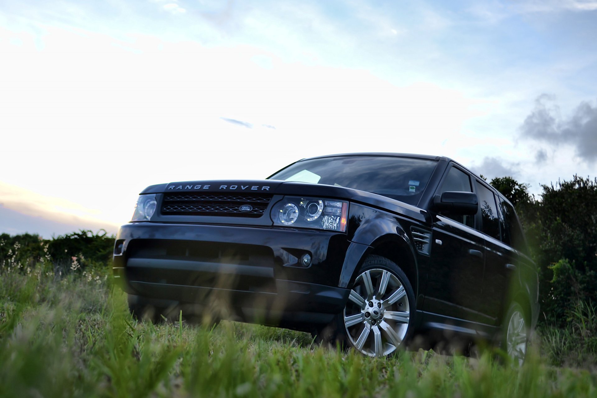 land rover range rover sport black front grass sky tree range rover sports