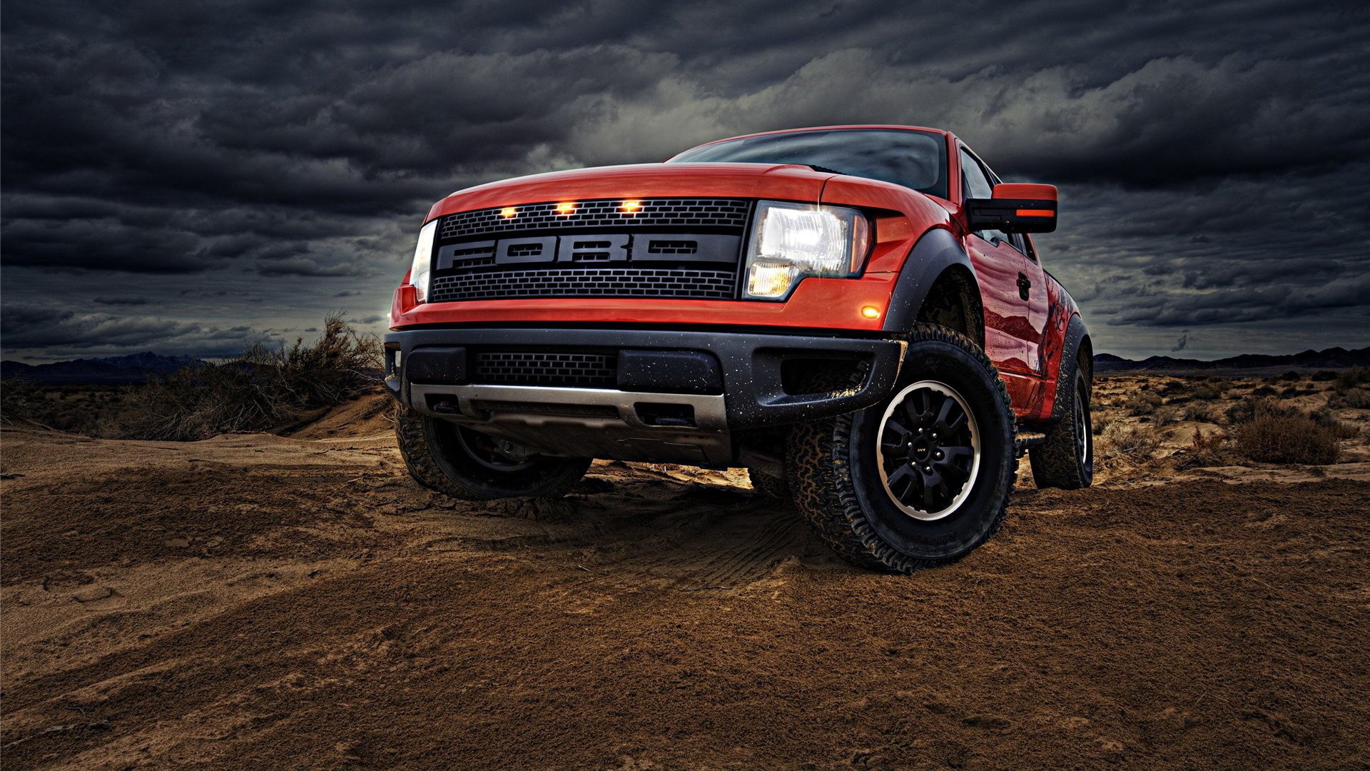 Red Ford against the sky. Bottom view