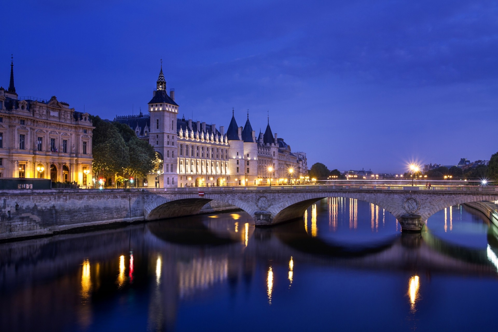 lights town river france bridge reflection paris qatar airways night lock of the conciergerie palace of justice lighting light