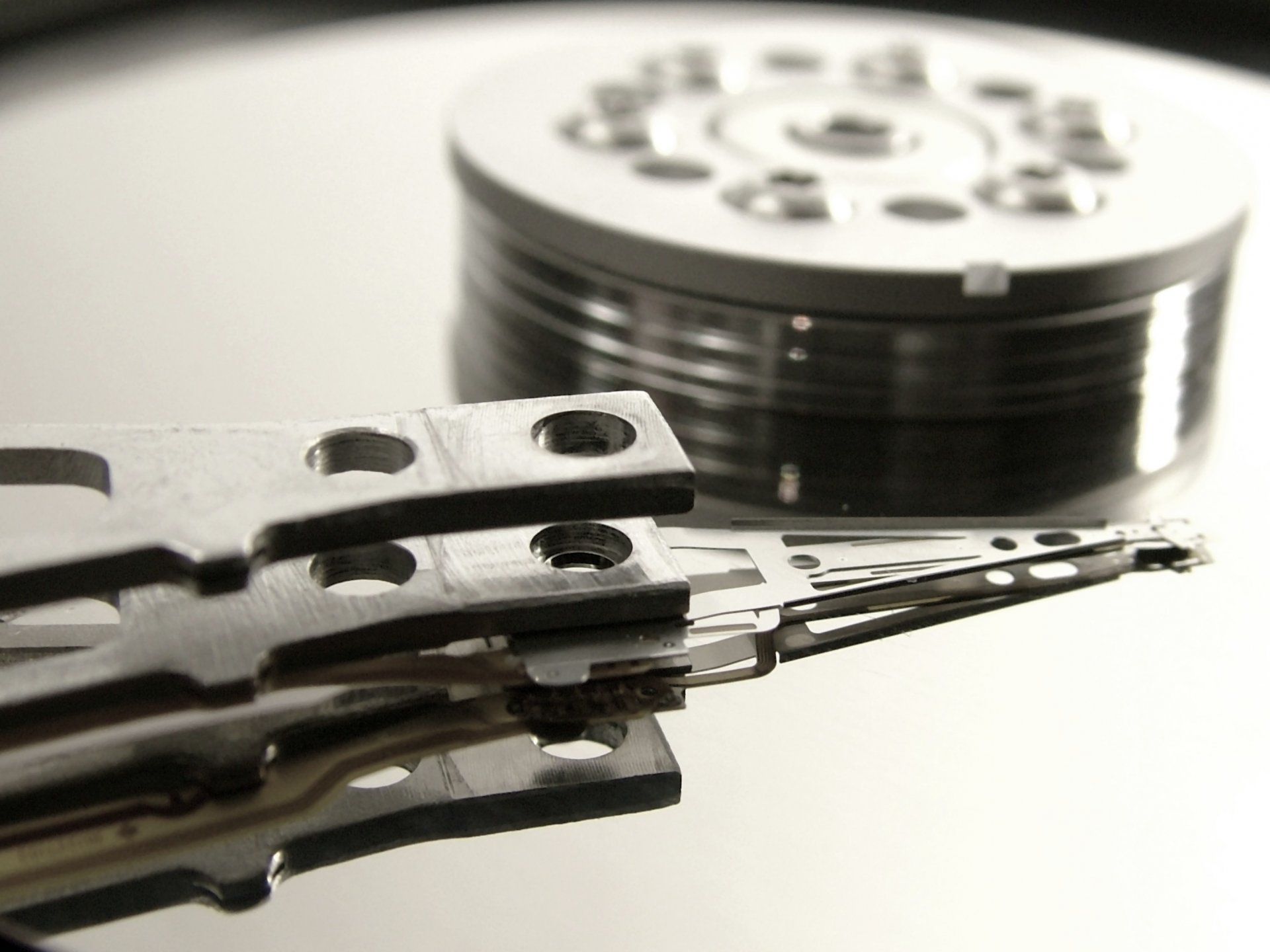 Magnetic disk spindle in black and white photo