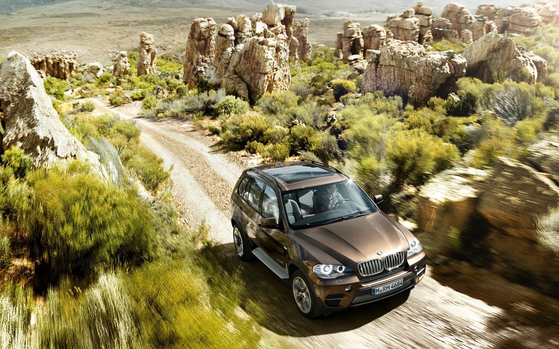 Overcoming off-road bmw x5 at high speed