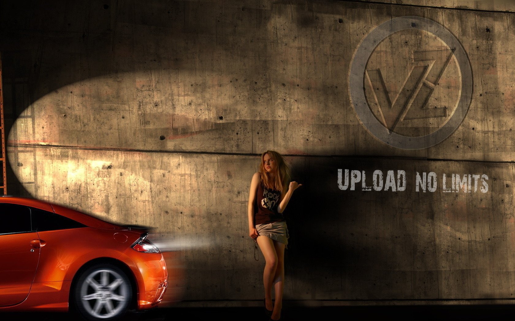 A girl against the wall against the background of a car
