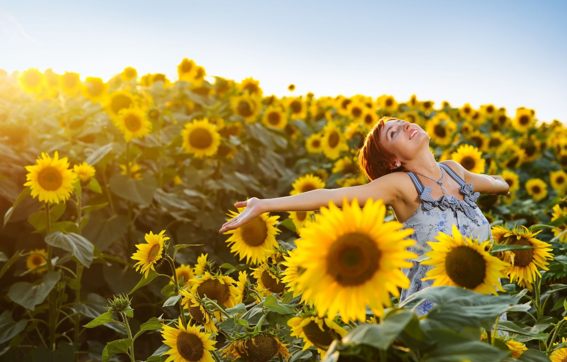 flower positive happiness girl mood widescreen background wallpaper sky sunflowers hands the field full screen yellow sunflower