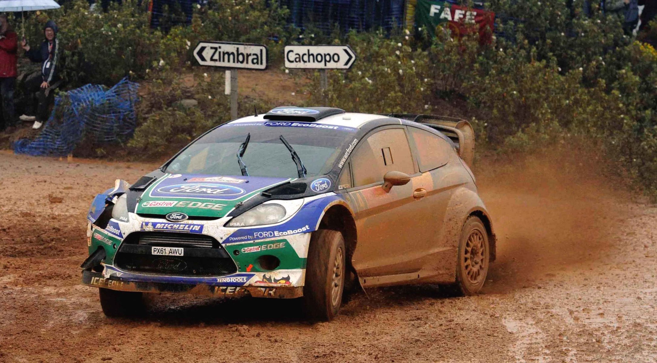 ford fiesta wrc rally car dirt rain front sports machine race