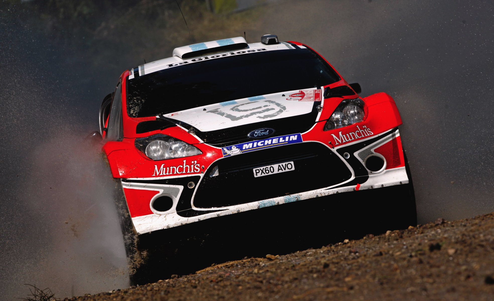 ford fiesta wrc rally car machine speed sports race water spray front red light