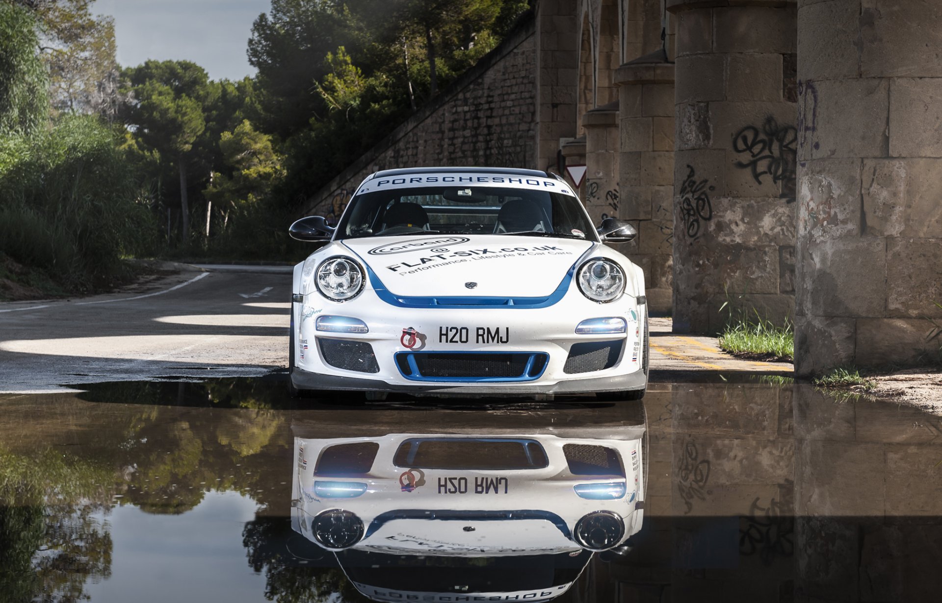 porsche 3.8 carrera s eurocupgt white sports car to reflection
