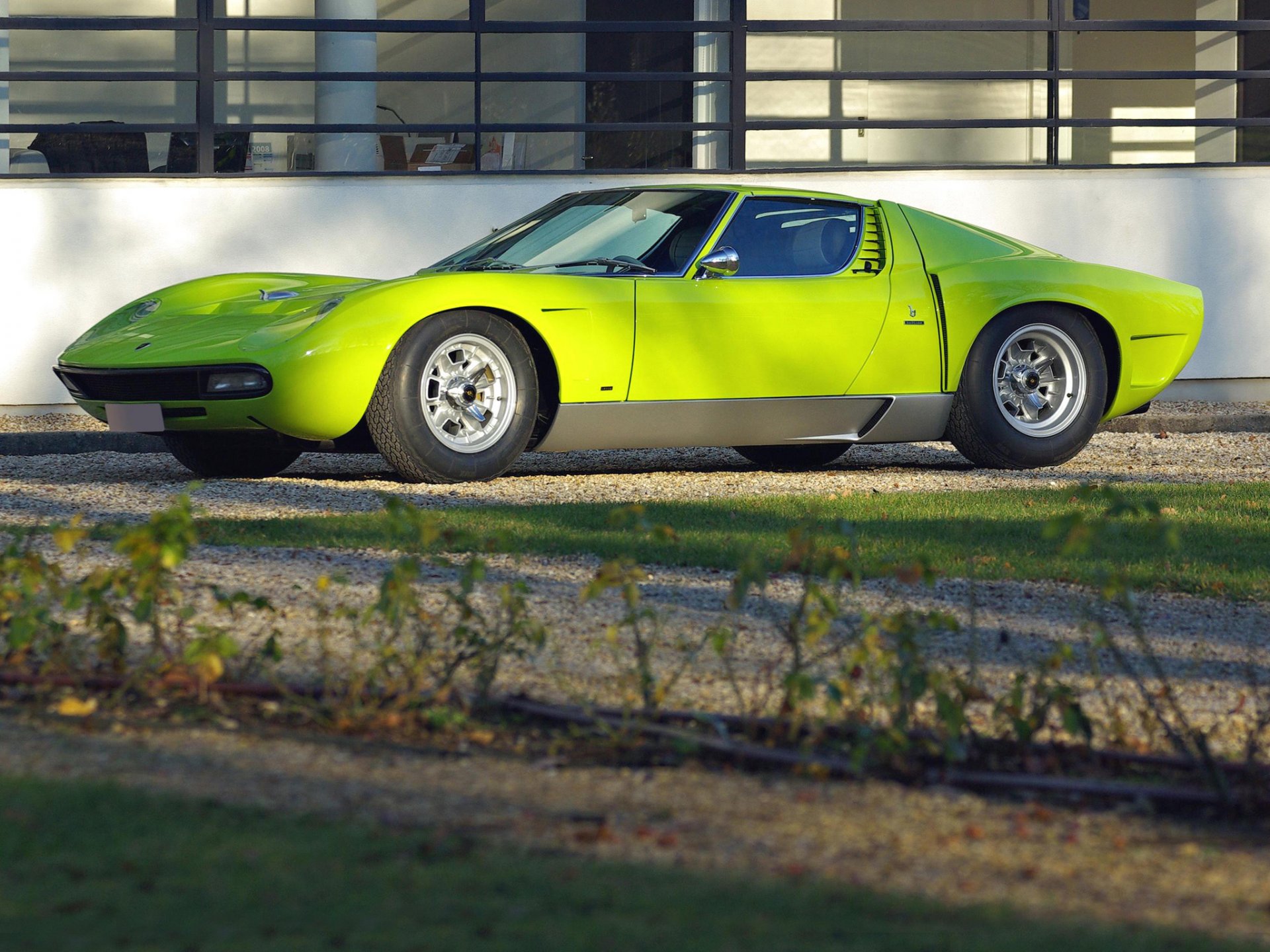 lamborghini miura lamborghini miura green a side view building