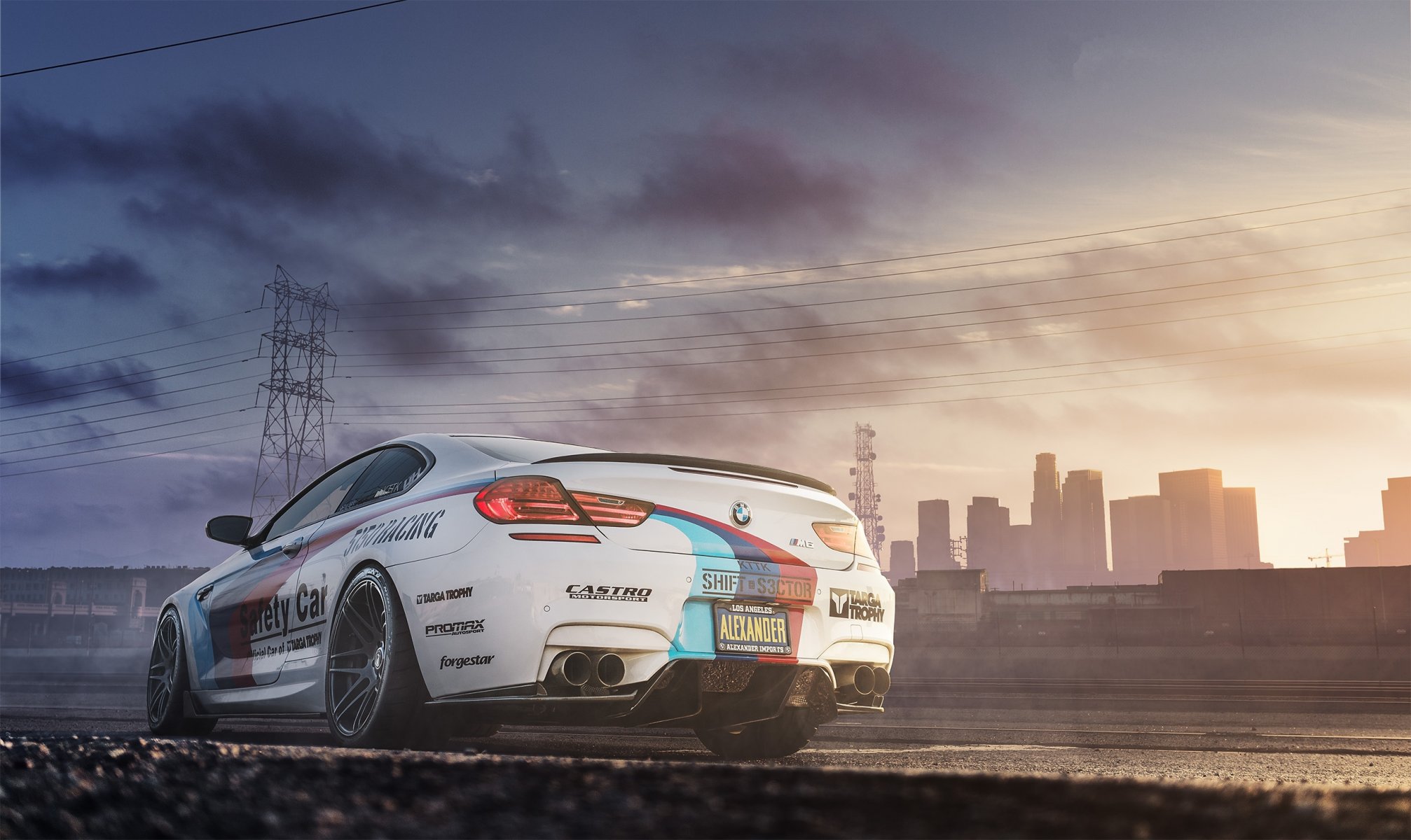 bmw m6 f13 white back of sky power line