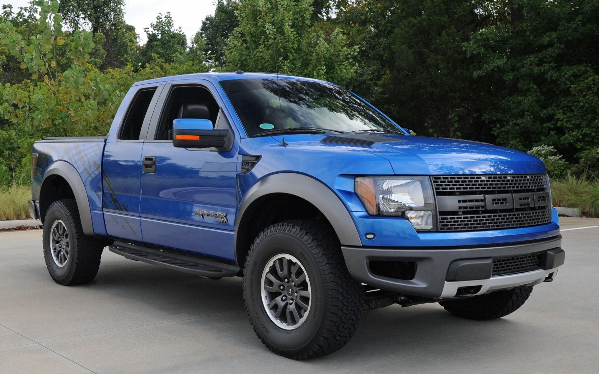 ford f-150 svt raptor supercab f- 150 truck jeep suv blue front tree background