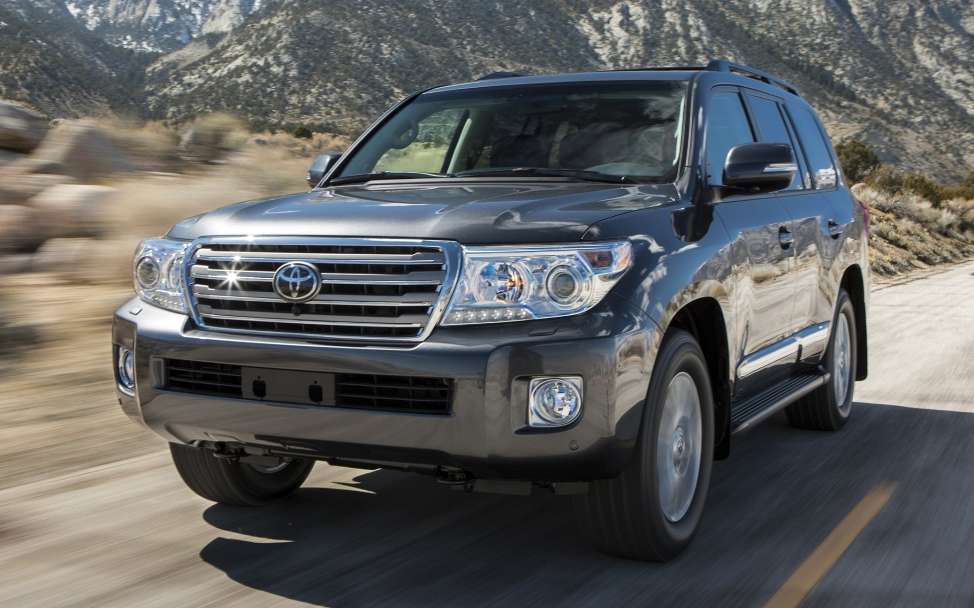 toyota land cruiser kruzak jeep suv front road mountain