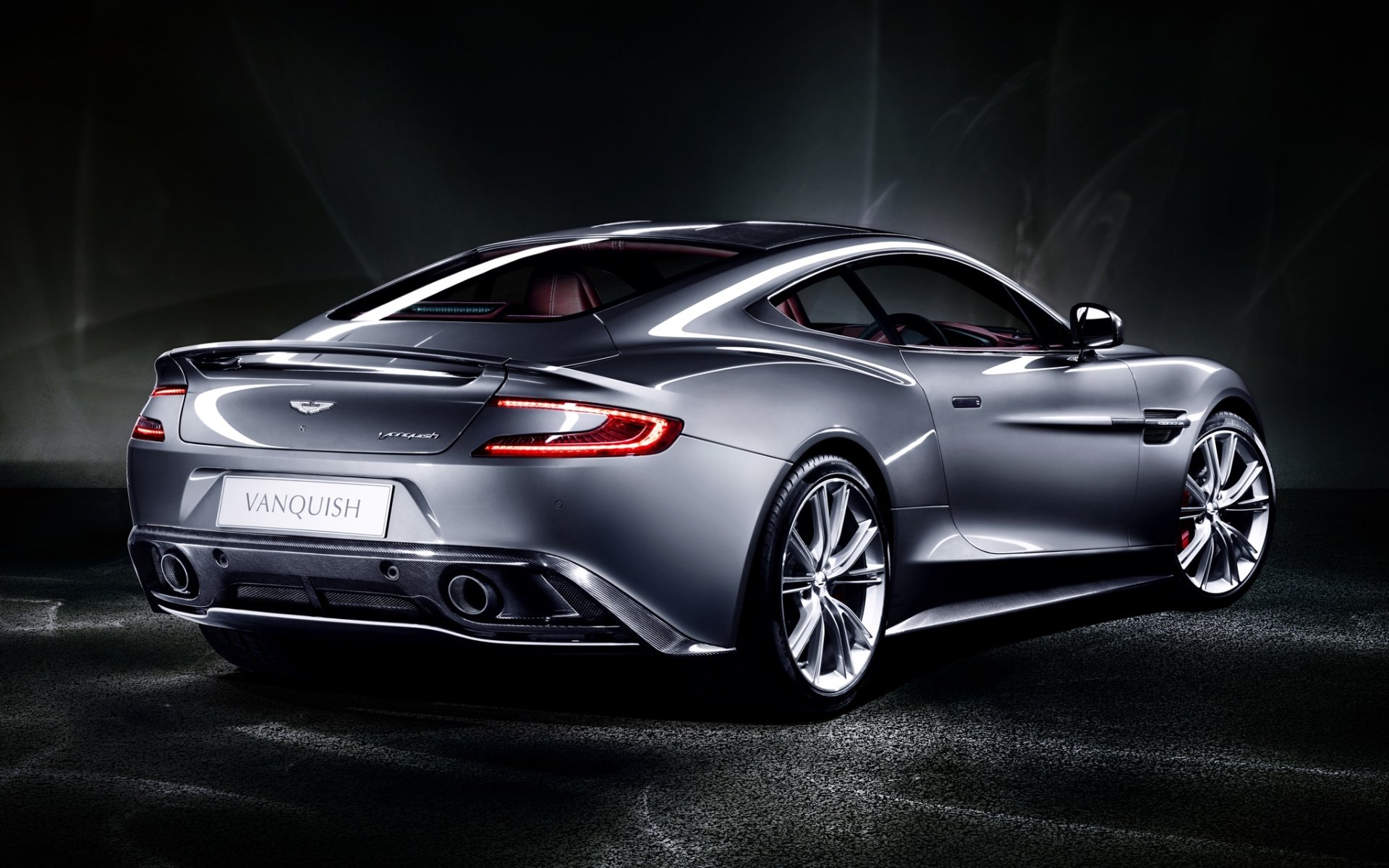aston martin vanquish vankuish supercar grey rear view twilight background