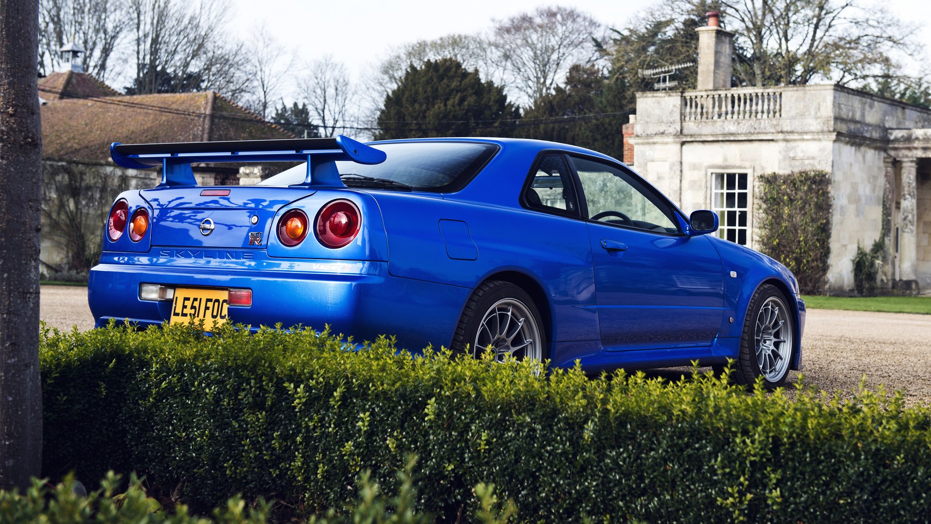nissan skyline gtr r34 blue back house bush tree gad p 34