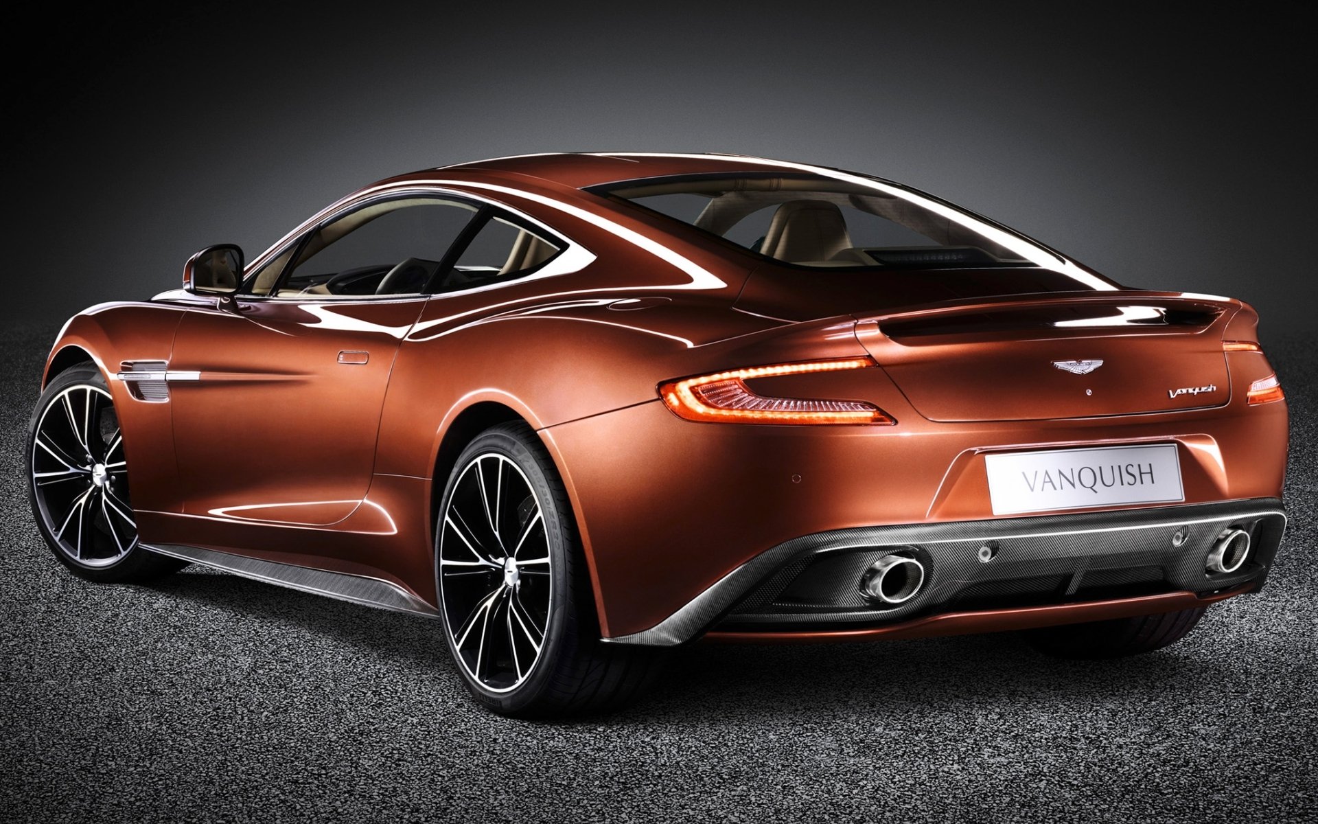 aston martin am 310 vanquish vankuish supercar rear view beautiful machine background