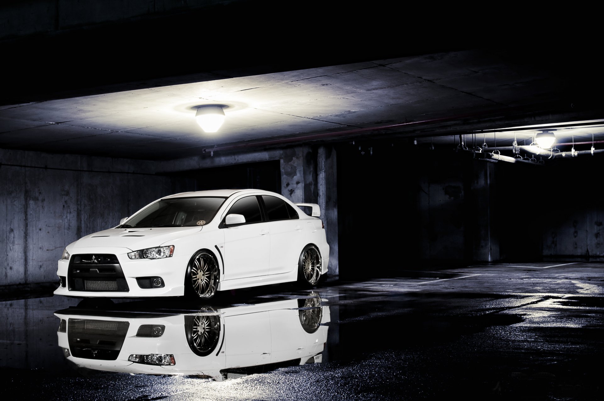 mitsubishi lancer evolution tein white front tuning light a pool reflection