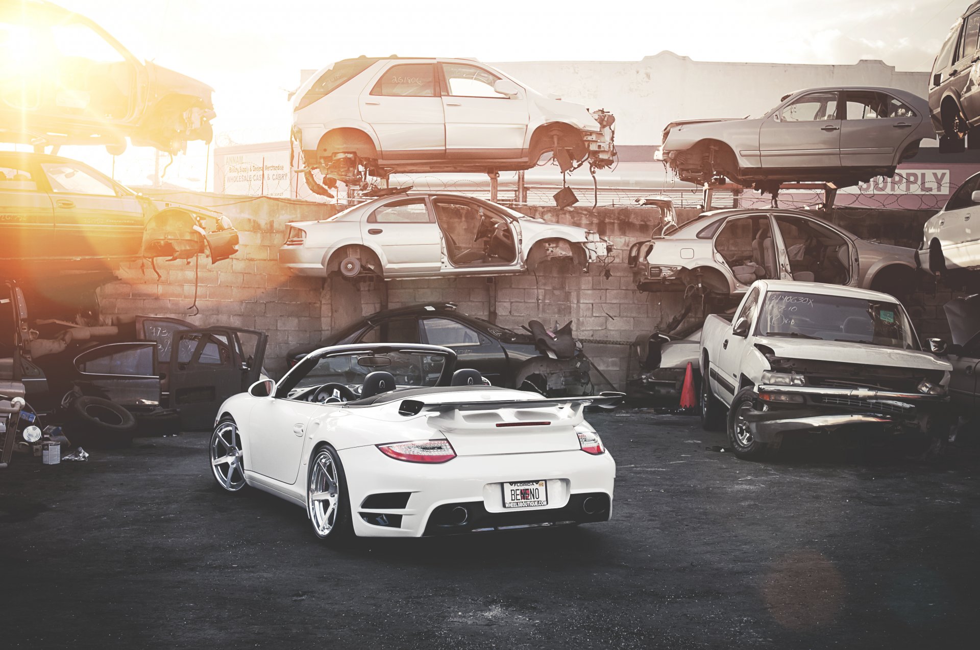 porsche 911 turbo white roadster junk broken cars dump sun highlight