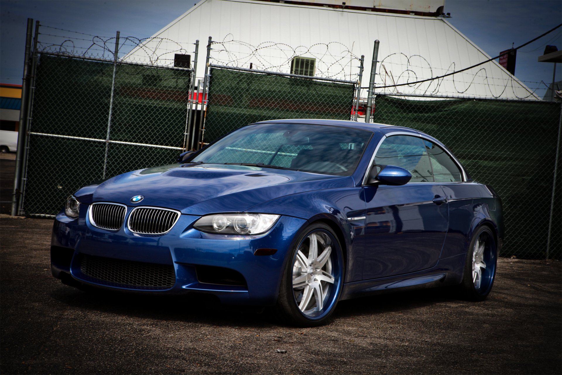 bmw m3 cabrio e93 blue reflection fence barbed wire