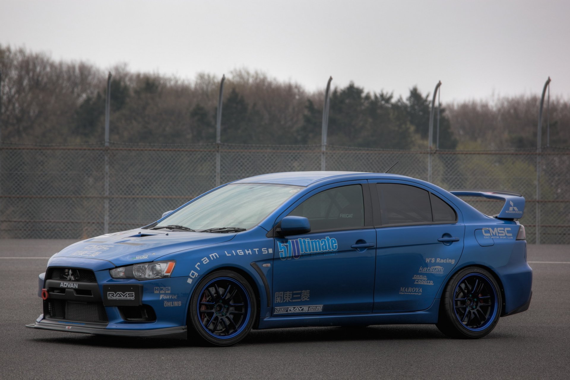 mitsubishi lancer evolution x blue lancer evolution tuning fencing sky