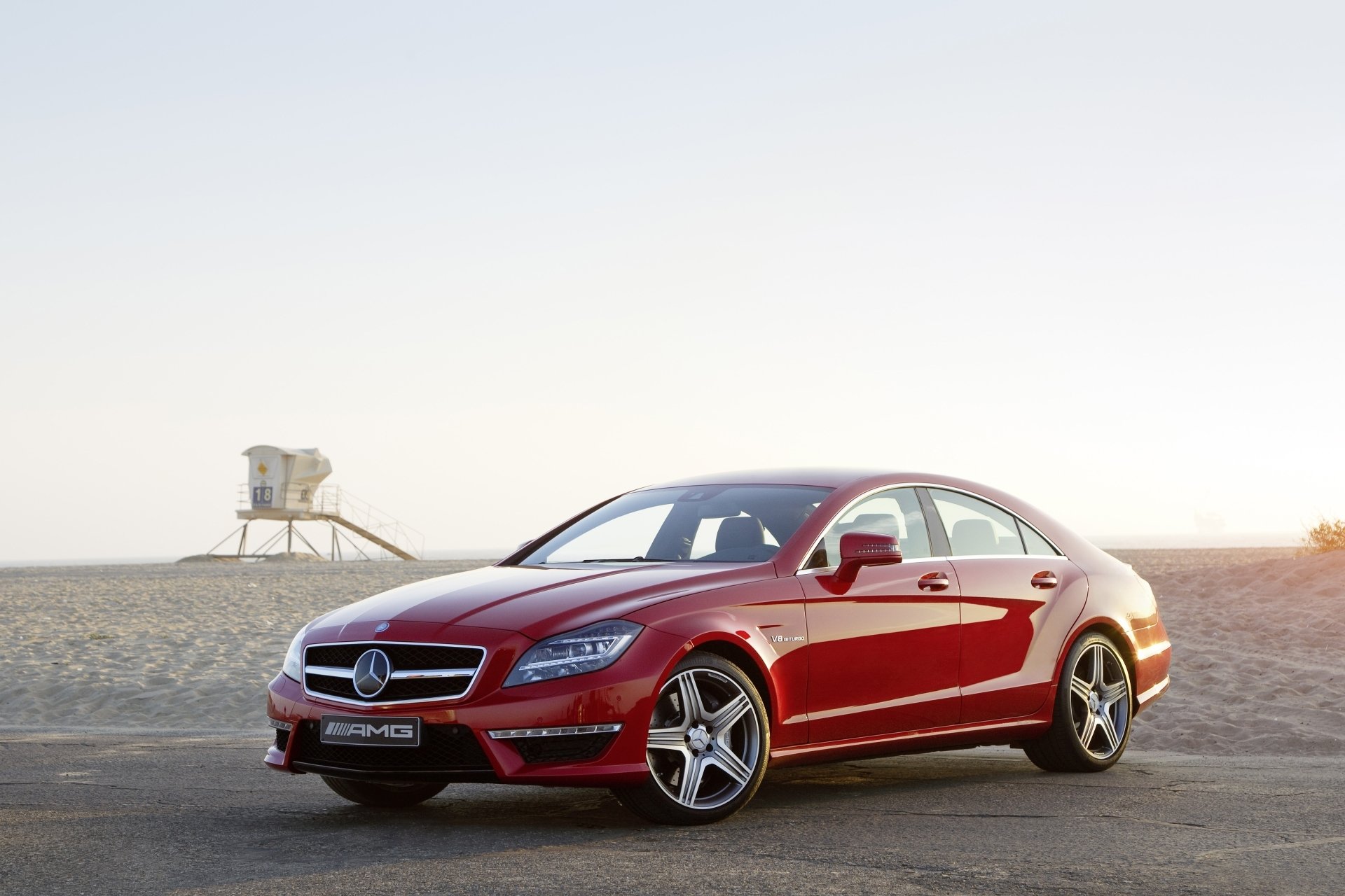 mercedes-benz cls63 amg mercedes tsls63 sedan red front beach sky