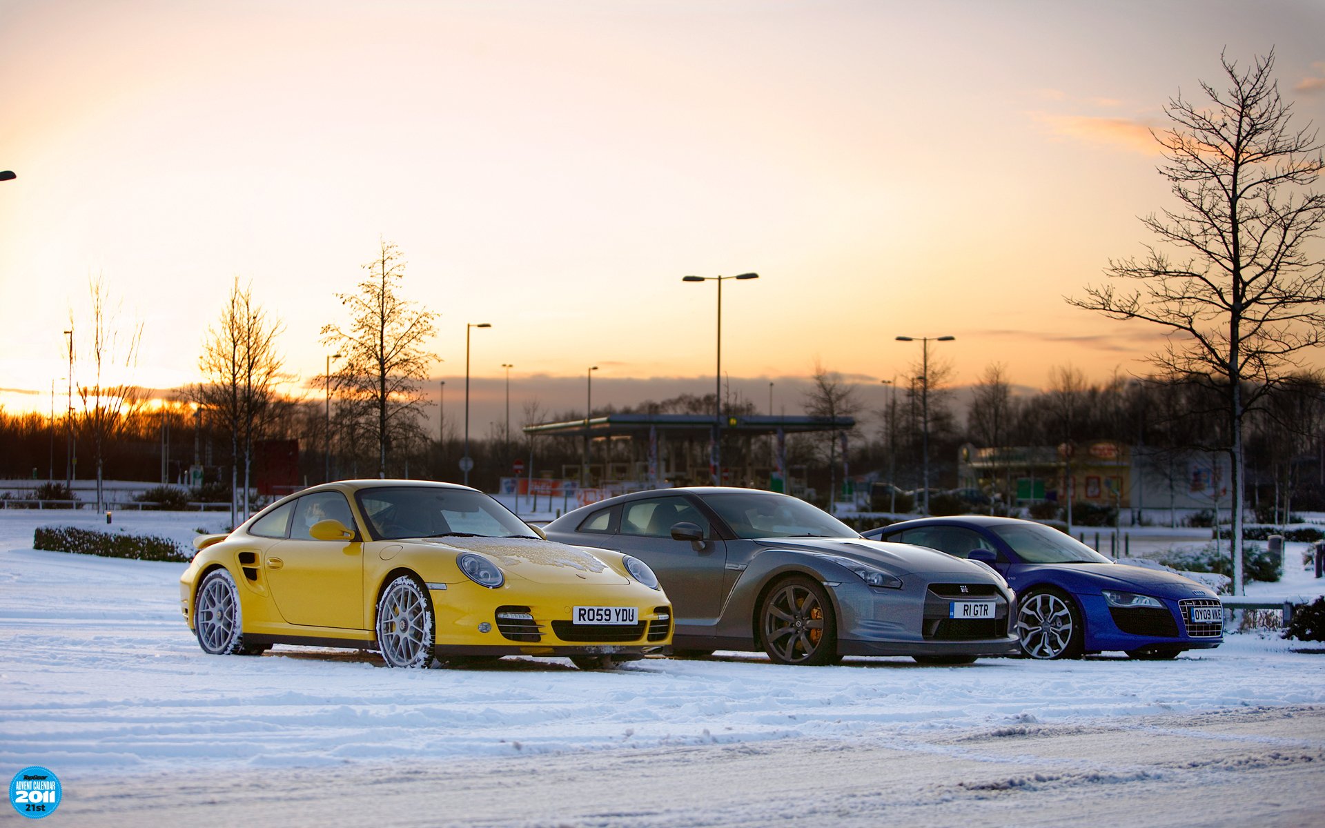 top gear advent calendar 21th the highest gear porsche 911 nissan gt-r audi r8 supercars front winter snow sunset sky