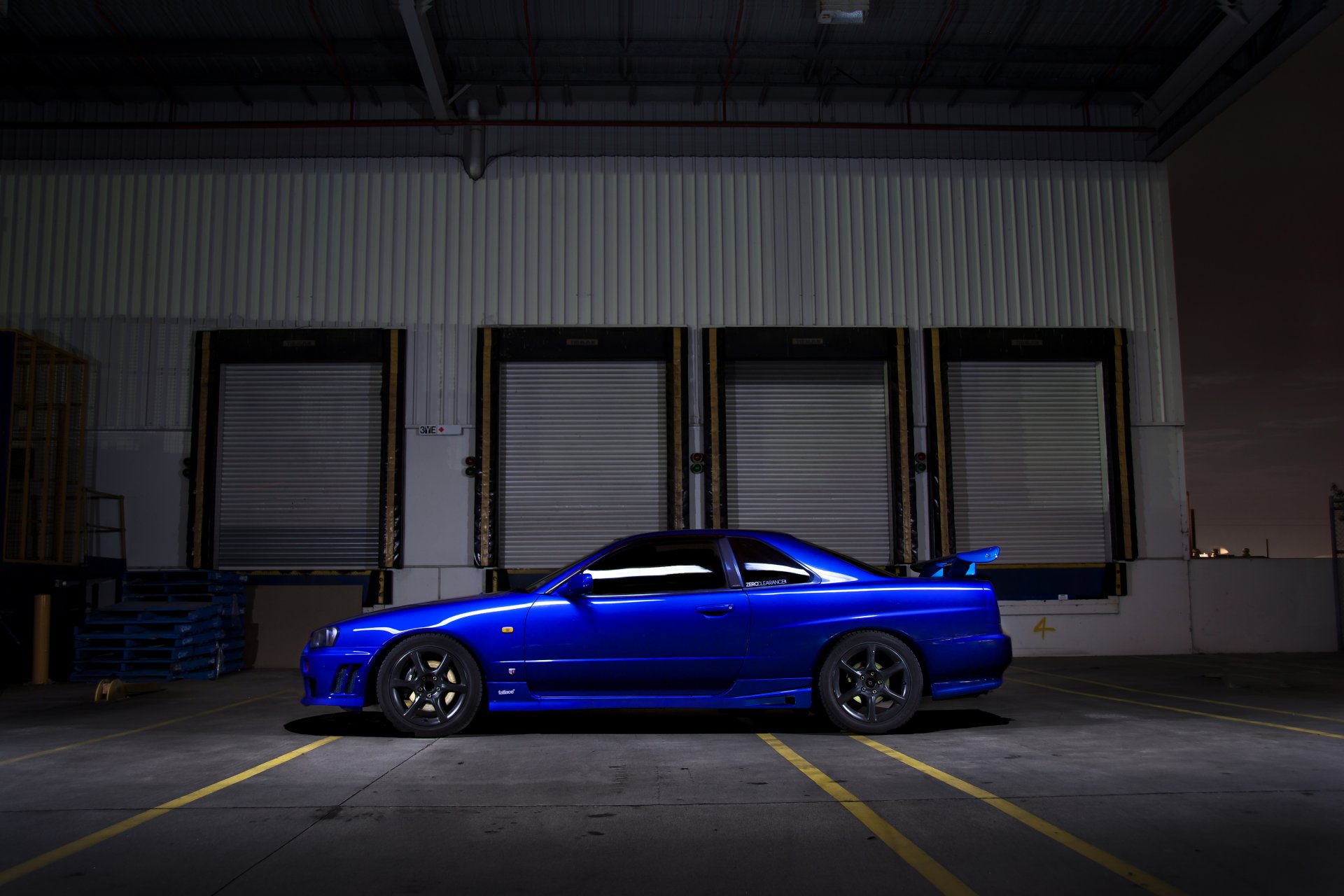 nissan skyline r34 blue wheels black section drives