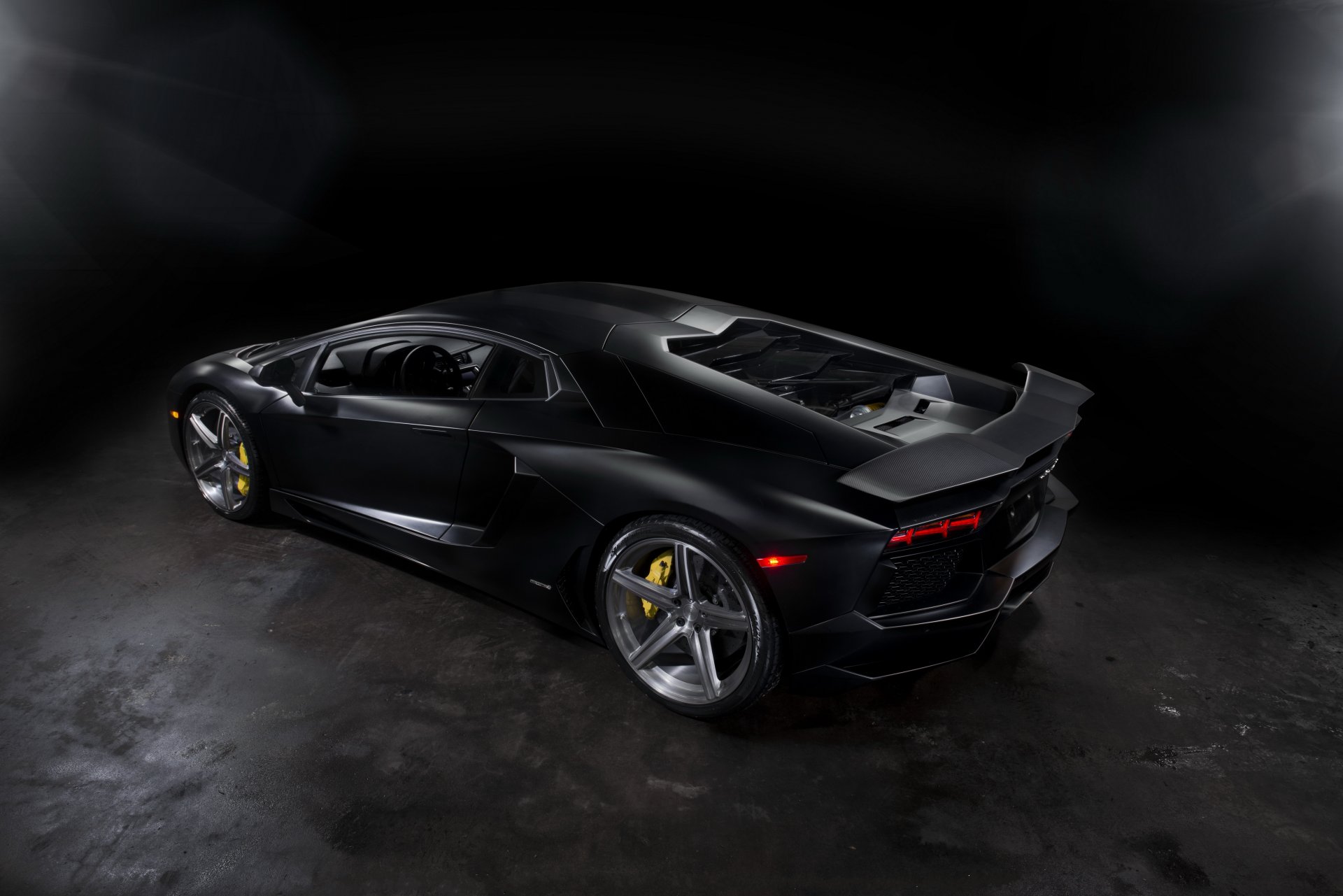 lamborghini aventador lp700-4 black matte rear view drives headlights