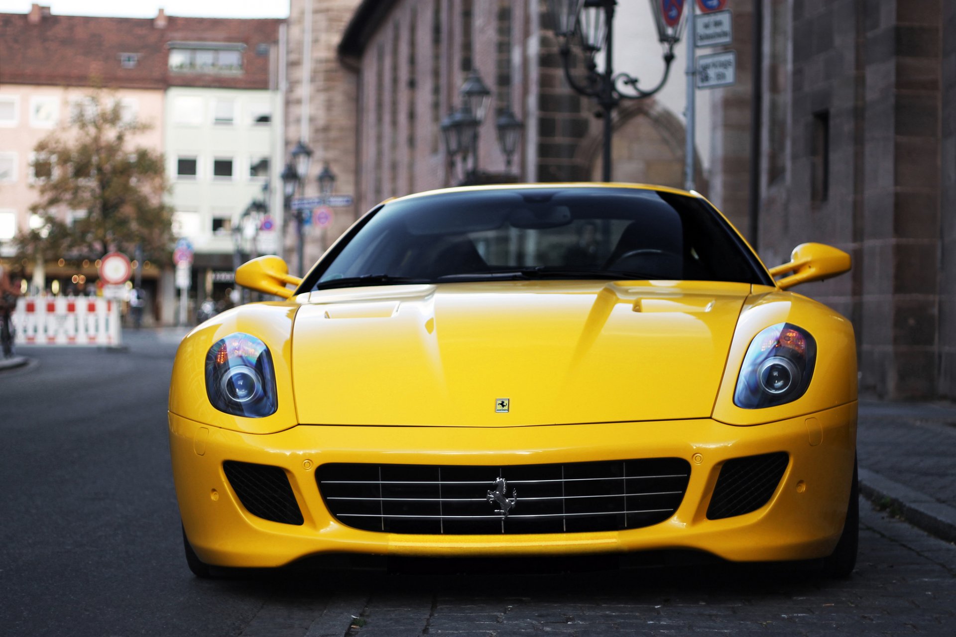 ferrari gtb fiorano v12 yellow supercar sportscar town bokeh blur