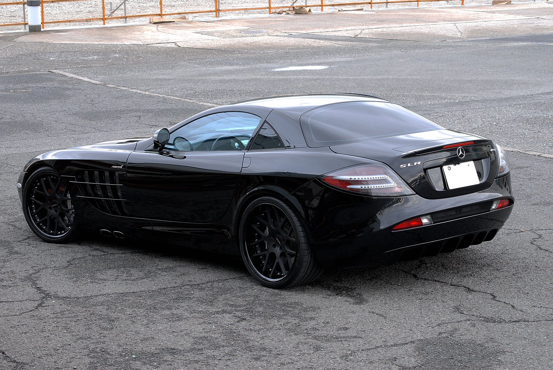 mercedes benz slr mclaren black mercedes-benz rear view reflection asphalt of the crack
